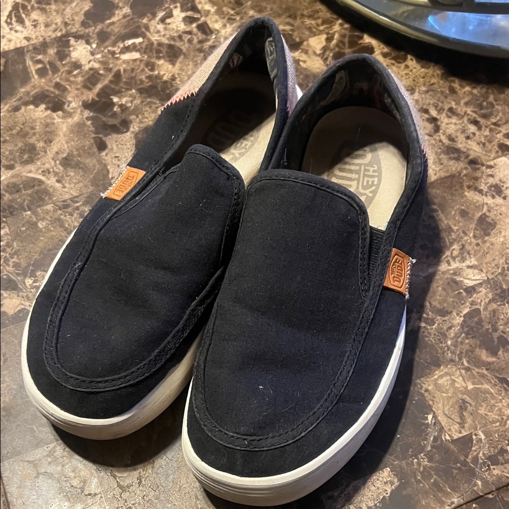Vans Men's Black Canvas Slip-Ons